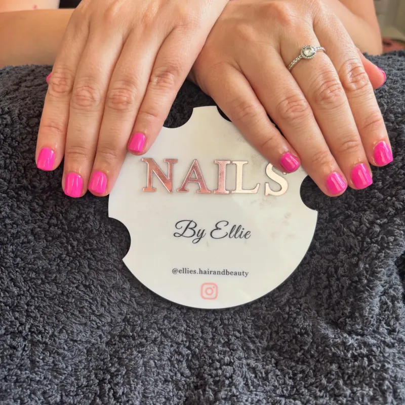 Bright pink glossy square-tip gel manicure
