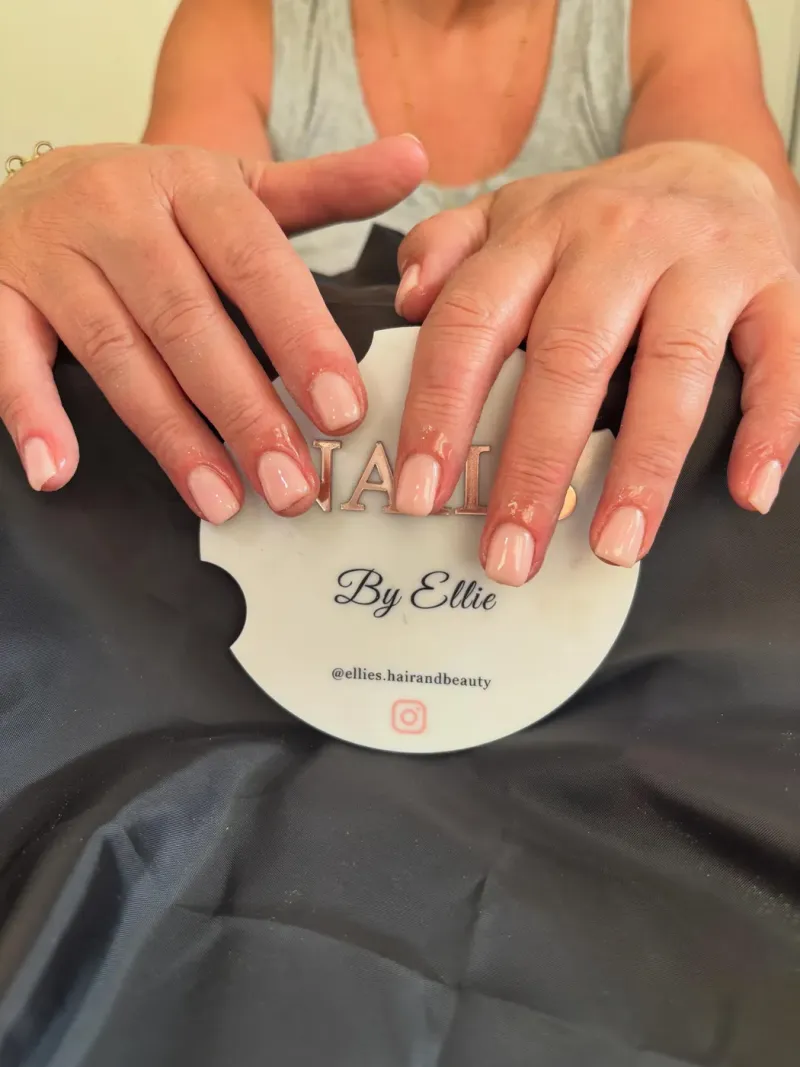 Nude pink square gel manicure with a glossy finish